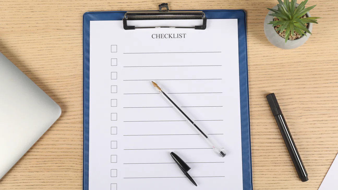 Checklist and pen on an office desk